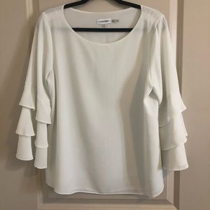 Like new. CALVIN KLEIN Ruffled sleeved top